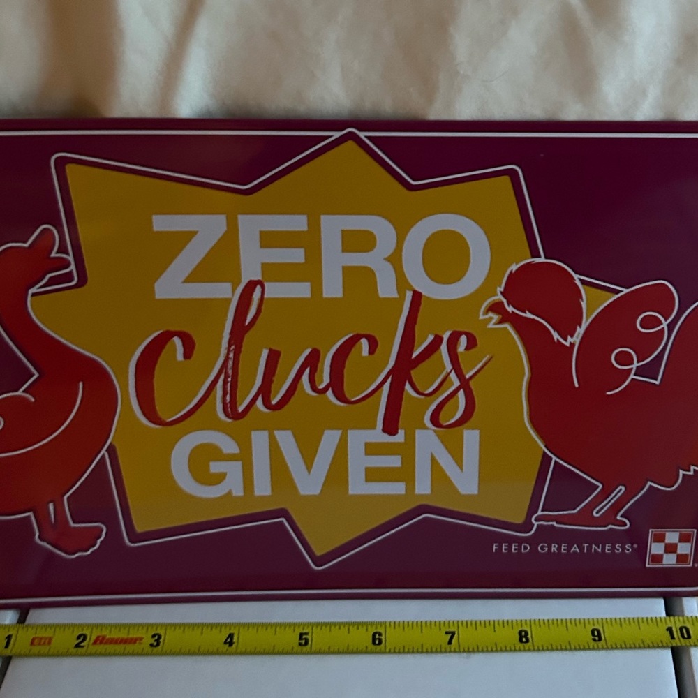 Bauer Red and Yellow Metal Sign